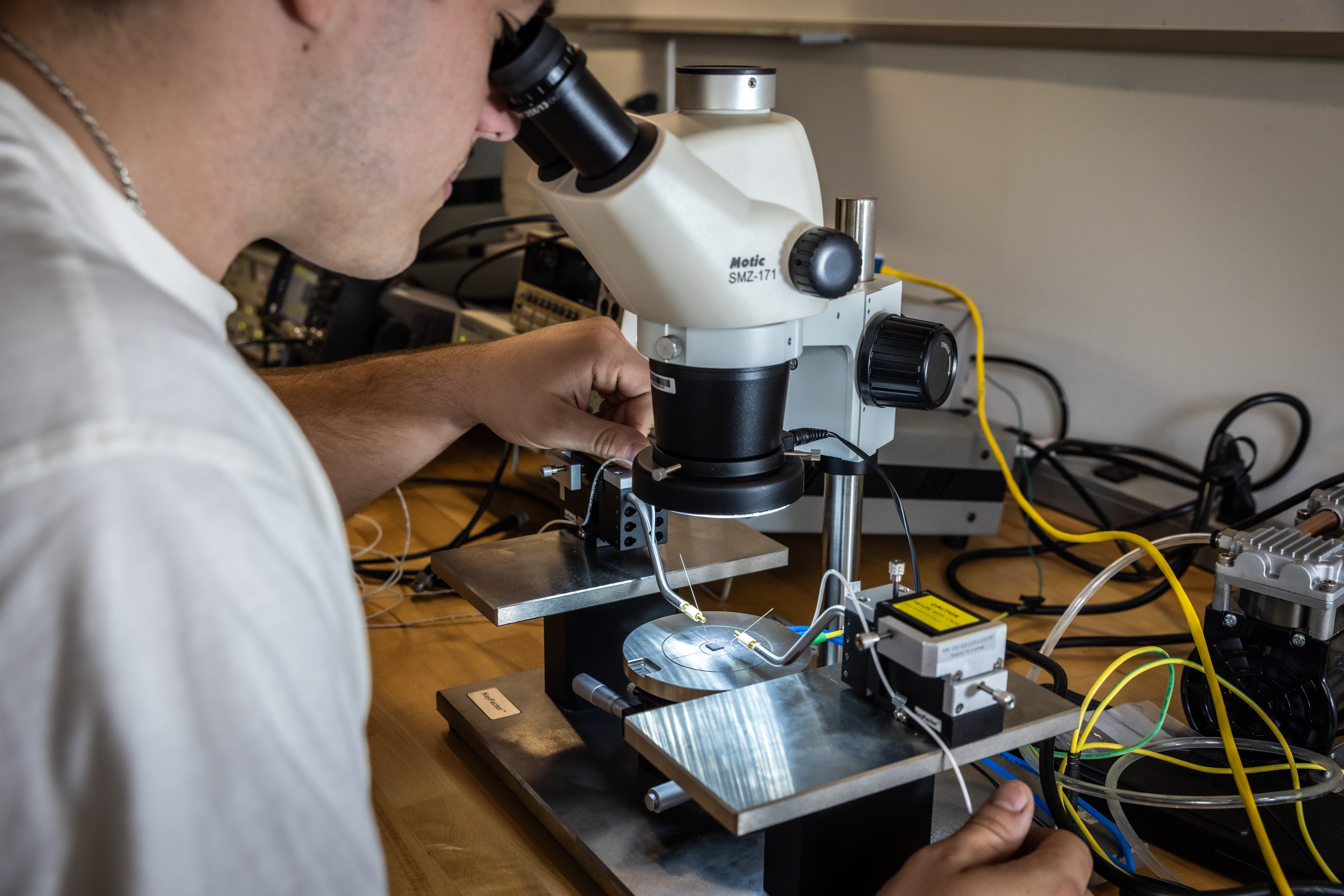 PLNU student works on technical project in the engineering lab.