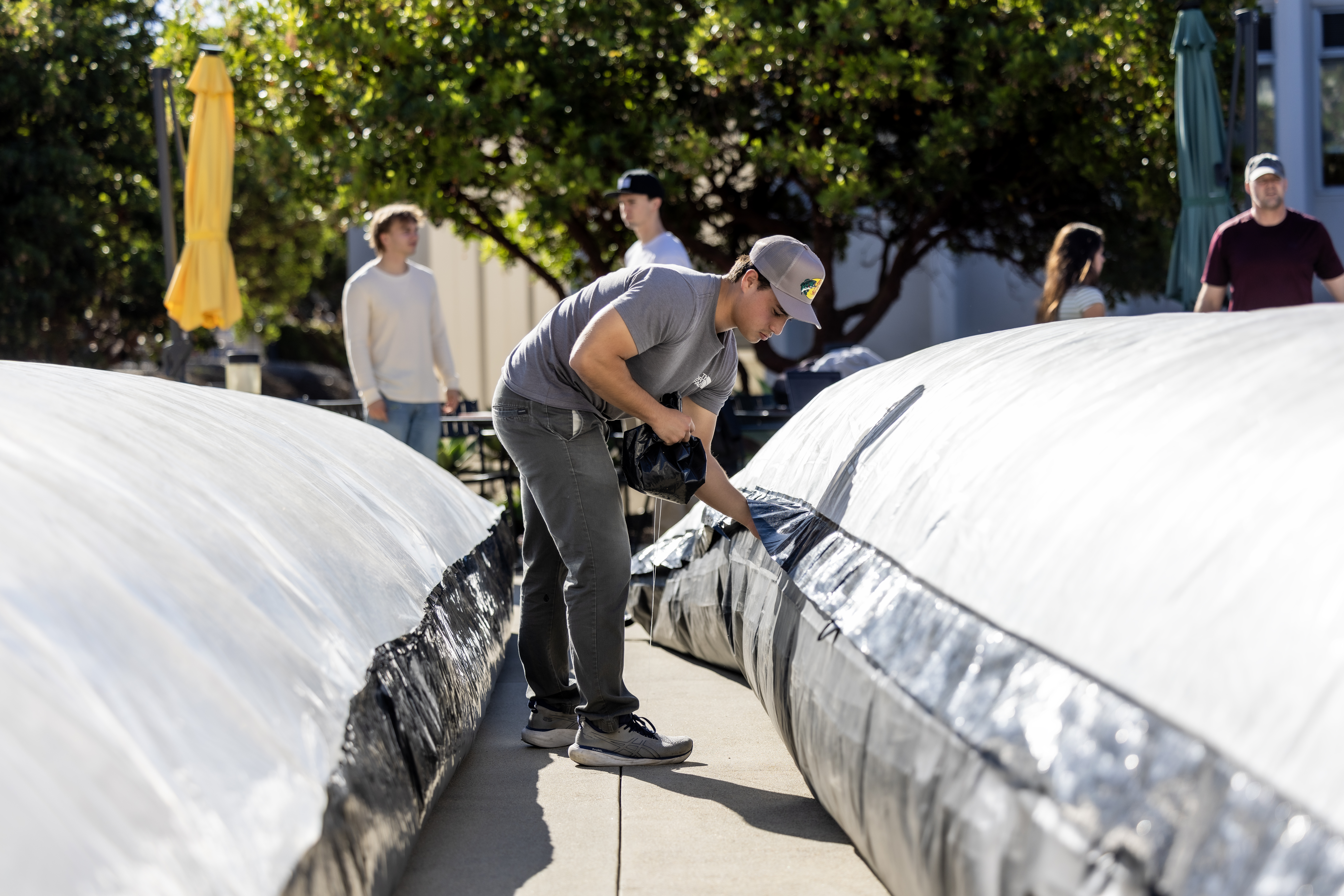 PLNU engineering student prepares a large-scale experimental structure as part of a senior engineering design project.