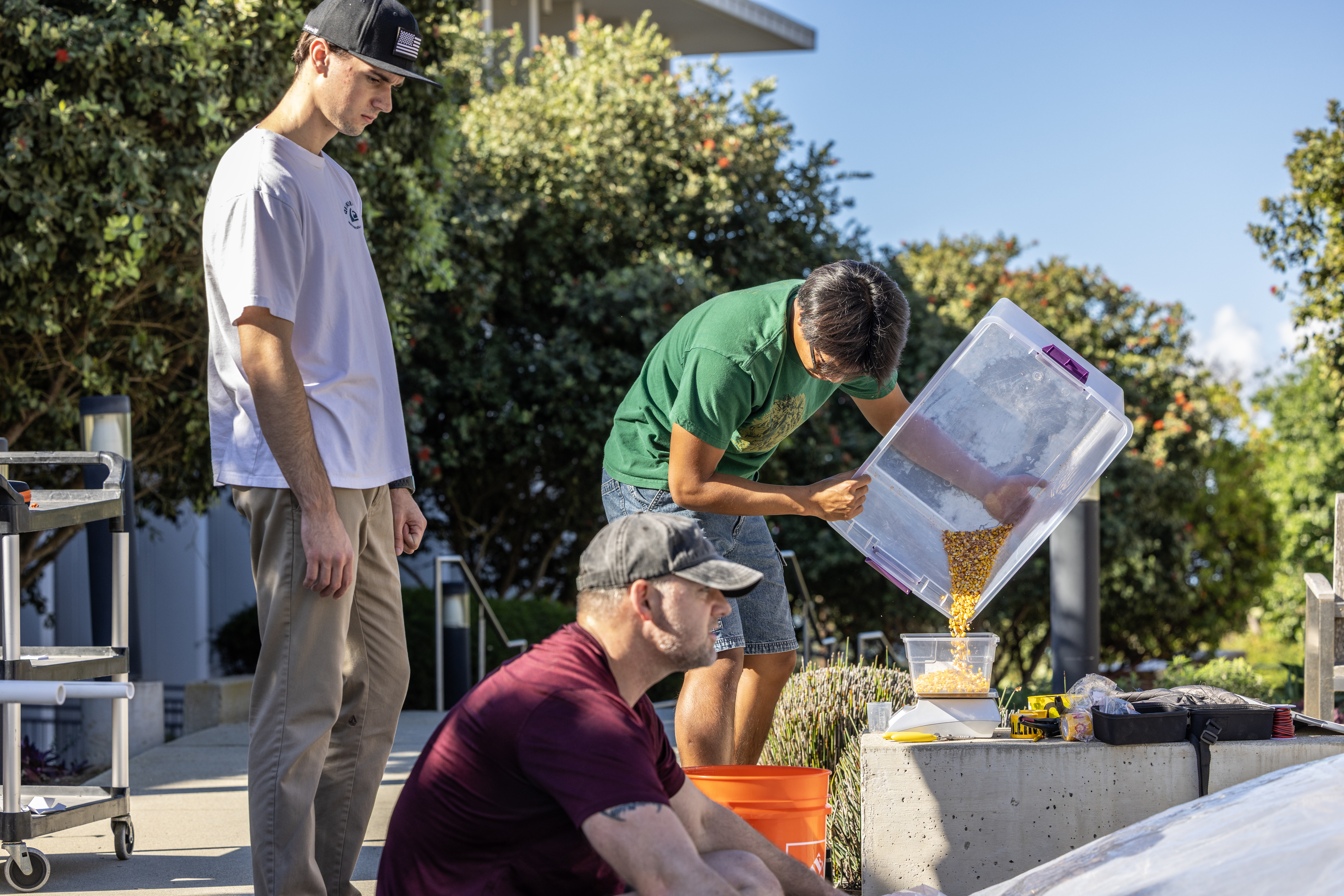 PLNU engineering students prepare materials and equipment for a senior engineering project.