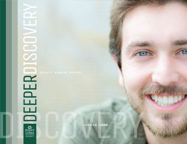 The cover of the annual report which features a close-up of a smiling student with bright blue eyes.