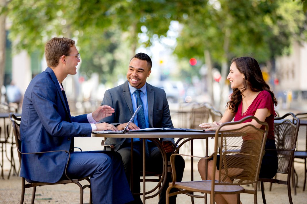 Business People Engaged in Conversation