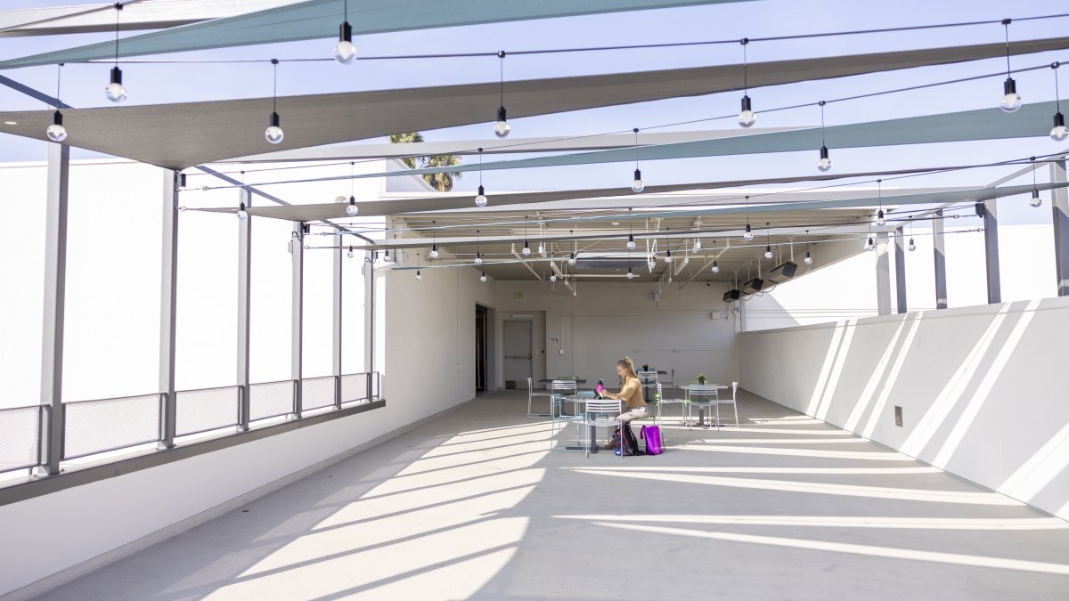 PLNU student studying in Balboa Campus space. 