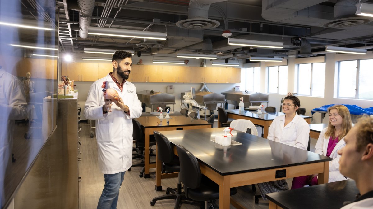 Associate Professor and Director Joy Y. Balta, PhD. gives anatomy lecture to students in Rohr Hall laboratory.