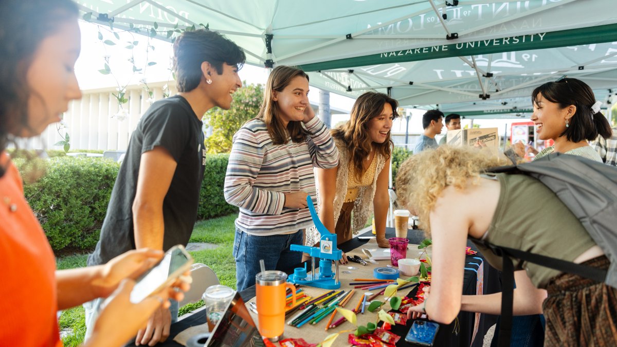 Students gathered at club booth