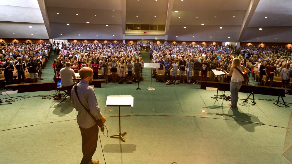 Large view from behind the band playing to a full crowd in the Brown Chapel