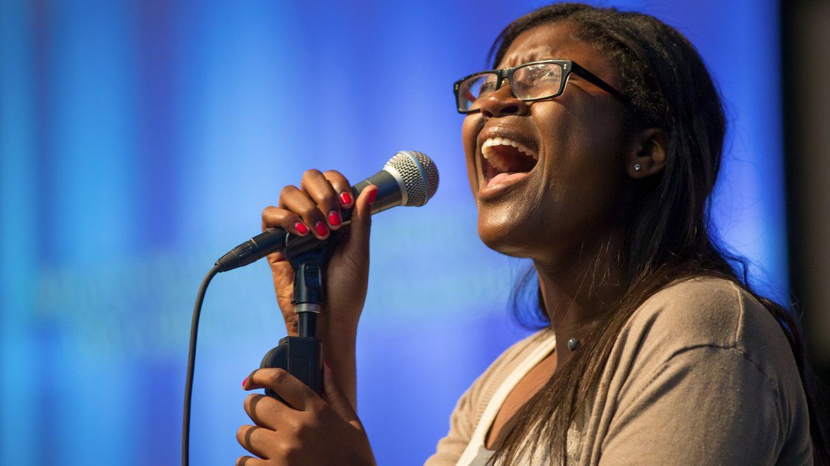 MBA student, Victoria Sibingo, passionately singing at chapel.