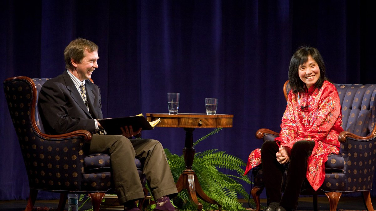 Dr. Dean Nelson interviews author Anchee Min at the Writer's Symposium by the Sea.