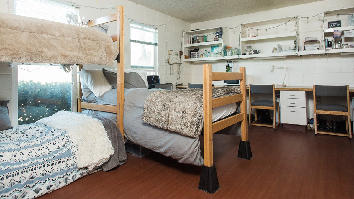 Three beds in a room in Young Hall.