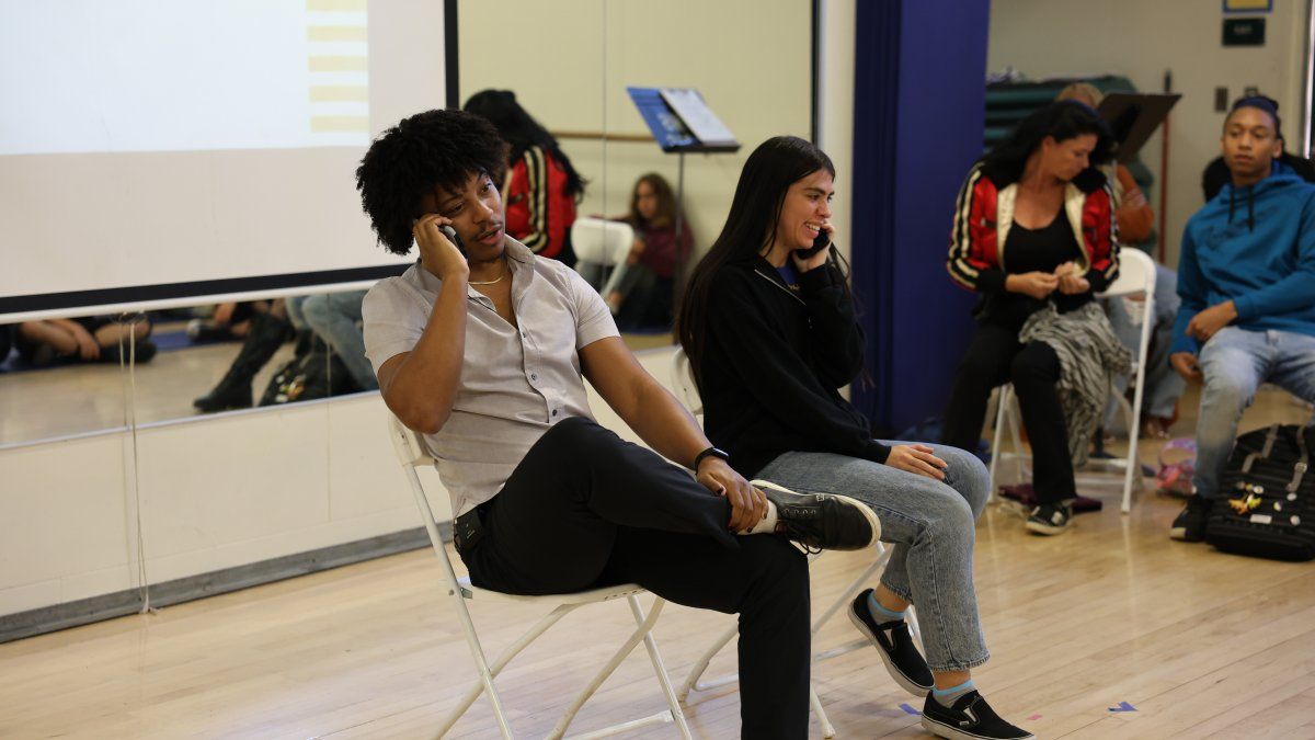 kNOwMORE students talking on the phone