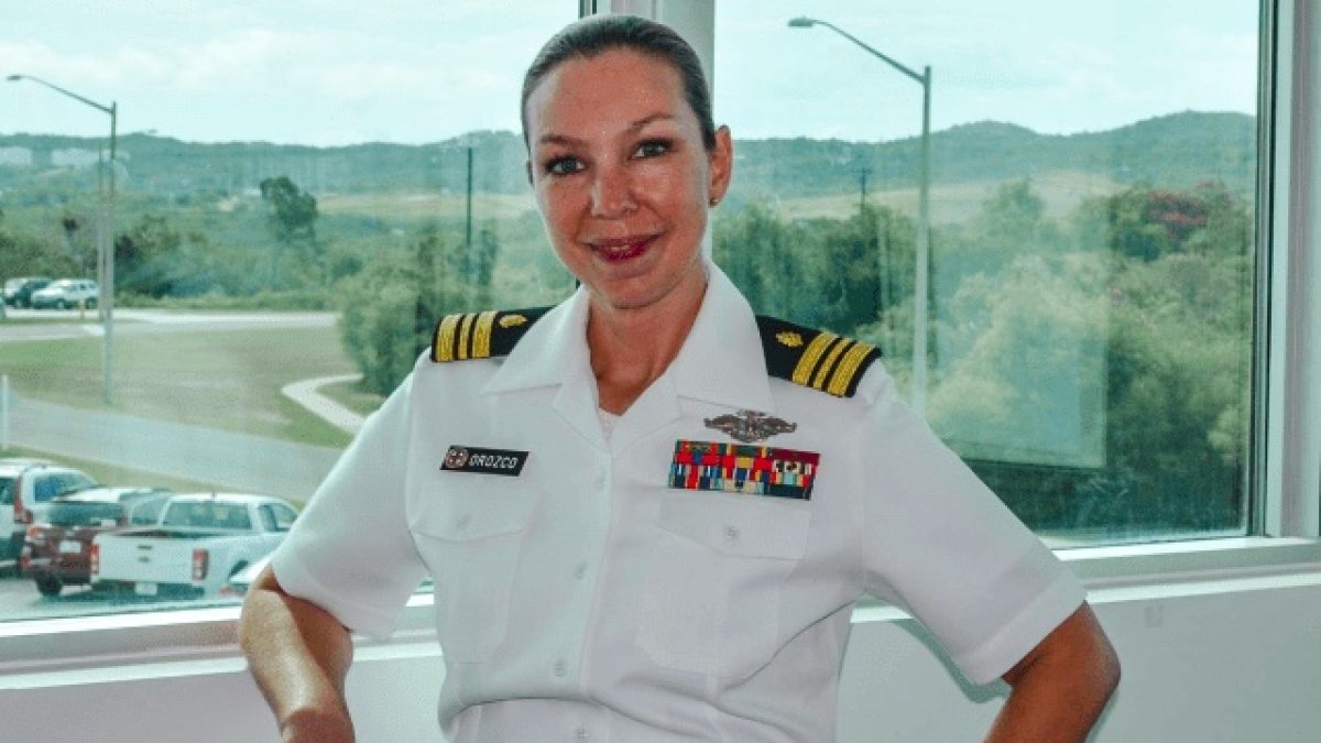 roberta posing for a photo in her military uniform 