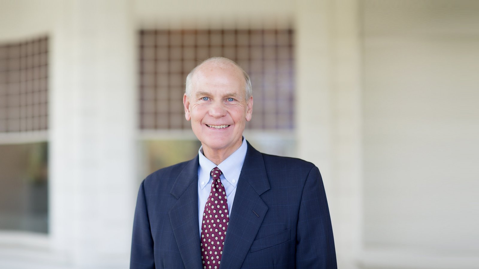 PLNU President, Dr. Brower in front of Mieras Hall