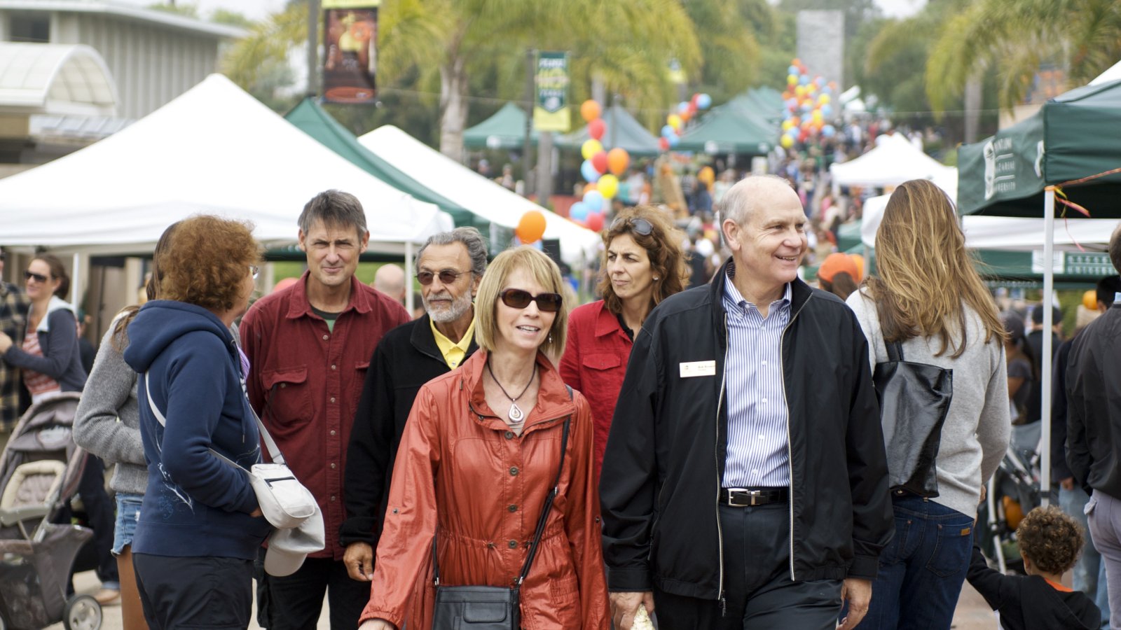 people enjoy Fall Festival on campus