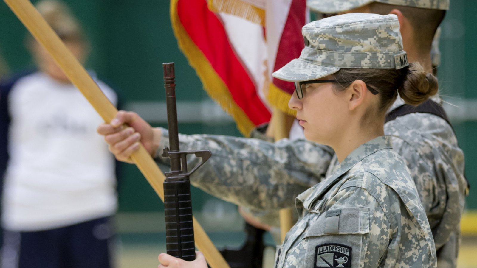 ROTC students proudly present colors during a PLNU basketball game