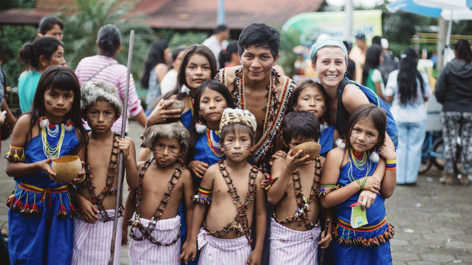 A PLNU student poses with new friends while studying abroad.