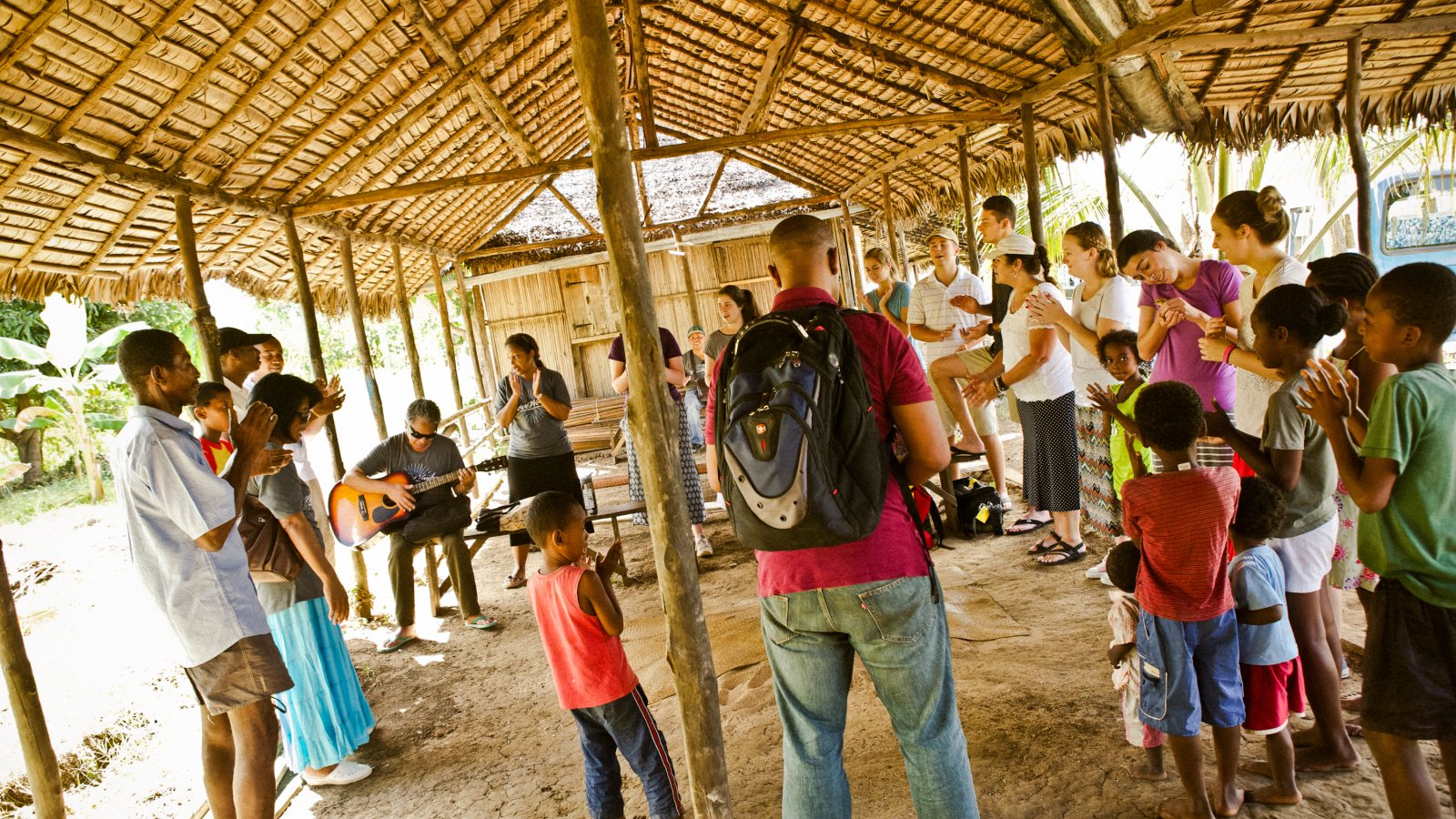 A loveworks group meets locals in Madagascar