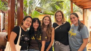 Women pose together on a trip to Peru to conduct field research. 
