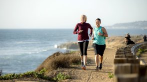 Integrative wellness students run the cliffs below PLNU