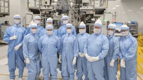 Photo of FSB Students & Faculty Inside ASML CYMER Clean Room