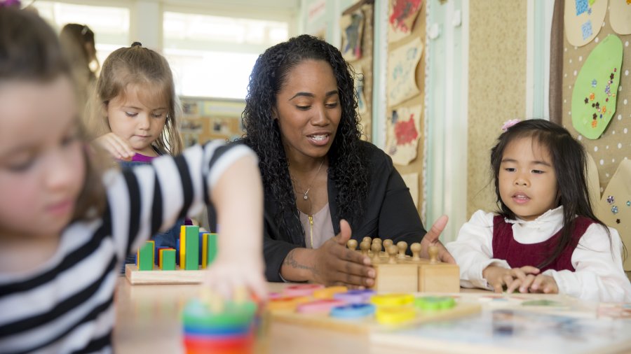 teacher helping a student 