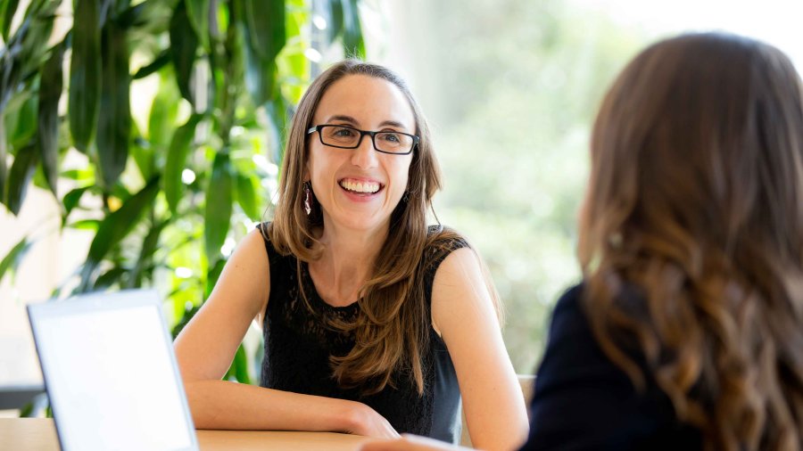 Two women have a business conversation