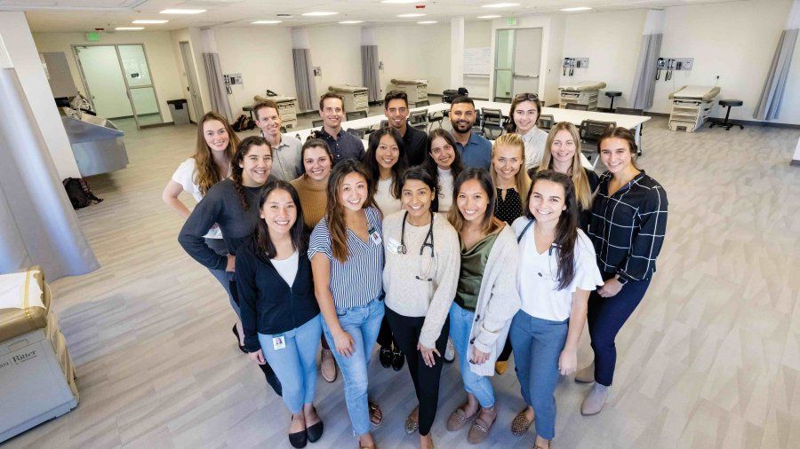PLNU's class of PA students smile for a photo