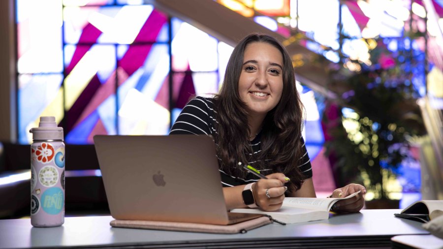 PLNU student works on her computer