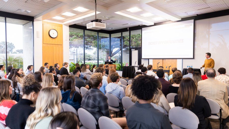 Business executive speaks to a room of PLNU students