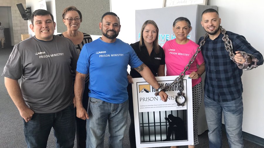 A group of students work a justice event