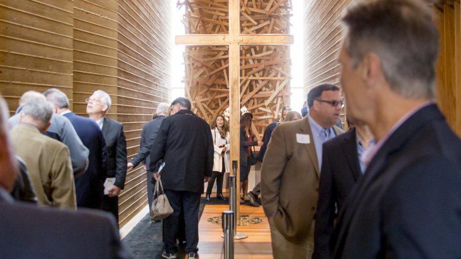 A large group tours the Prescott Prayer Chapel during its grand opening.