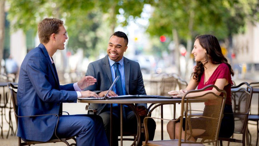 Business People Engaged in Conversation