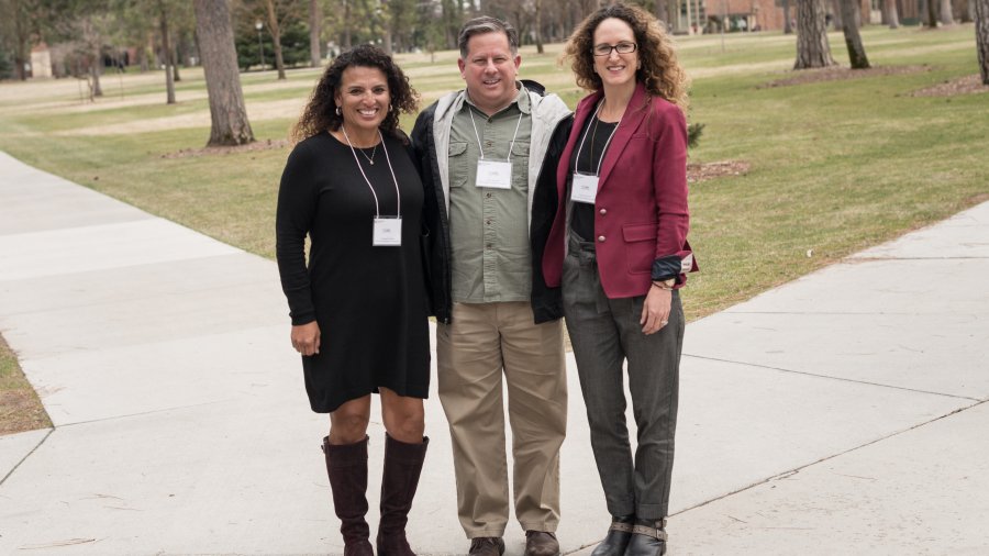 Jacque Mitchell, Scott Bennett, and Paula Cronovich at conference