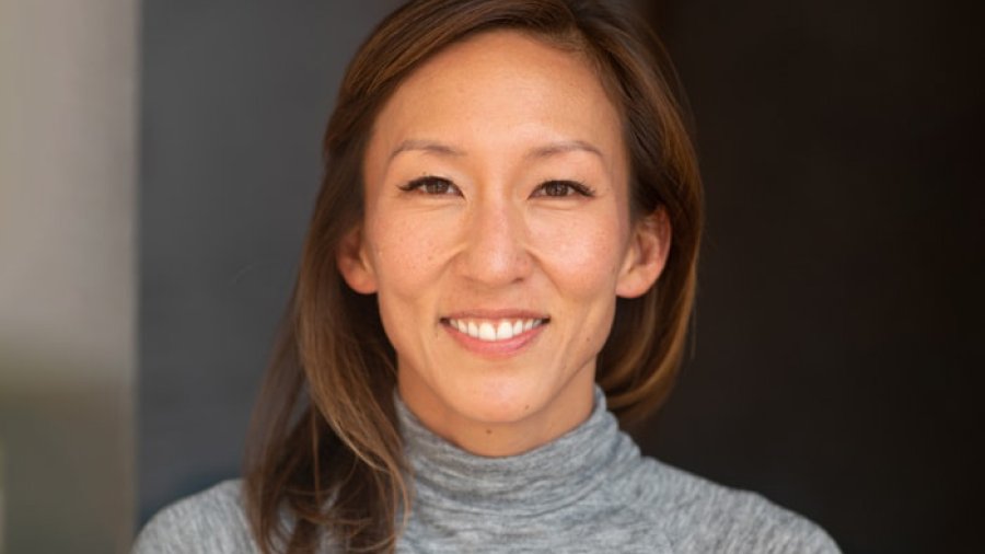 Portrait of Dr. Kay Tye smiling at the camera.