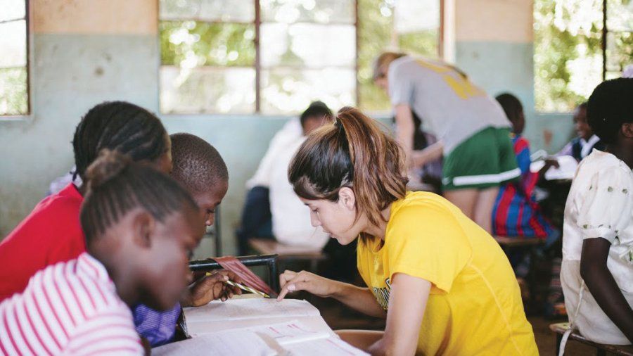 Student teaching to African school children