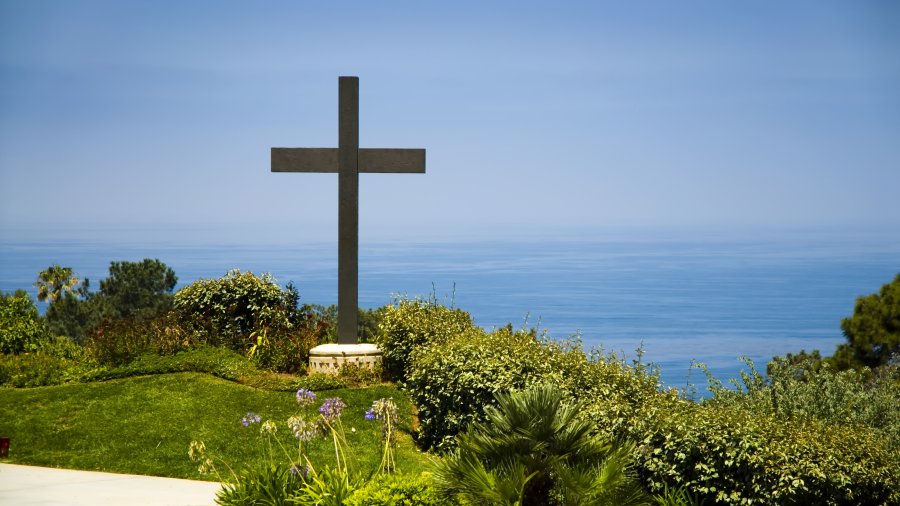 The PLNU cross overlooking the ocean.