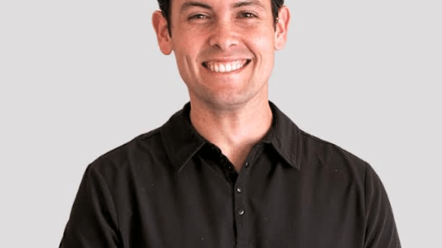 Portrait headshot of Elijah Martinez.