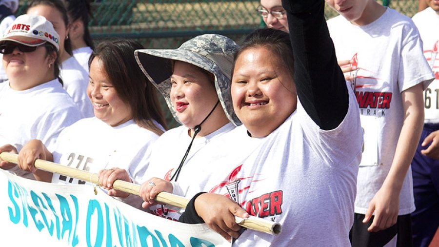 Athletes march in the opening ceremony of the Special Olympics at the PLNU track and field in San Diego