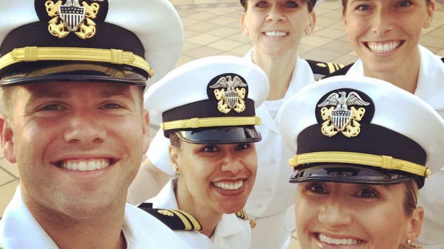 5 people posing for a selfie in military uniform 
