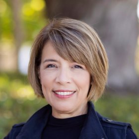 Portrait headshot of Gina Smith.