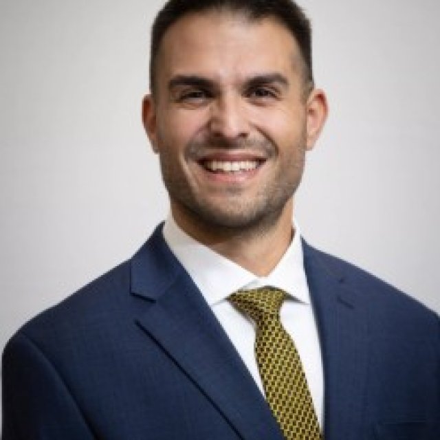 Portrait headshot of Antonio Squillante.