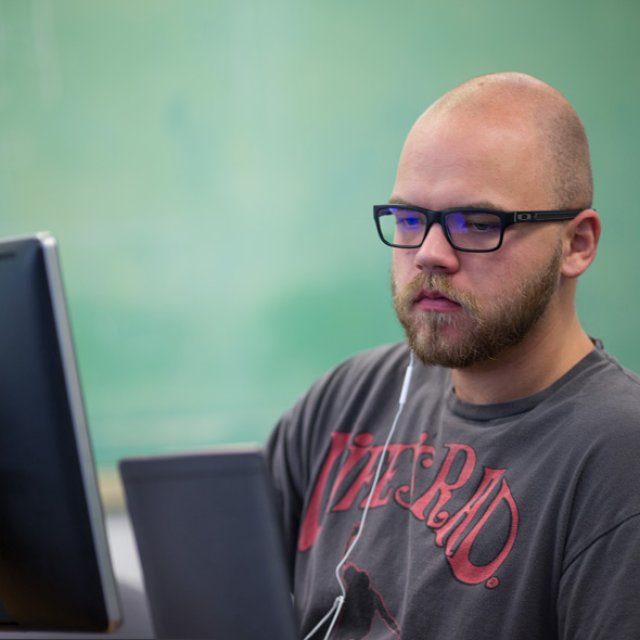 A student works on the computer.