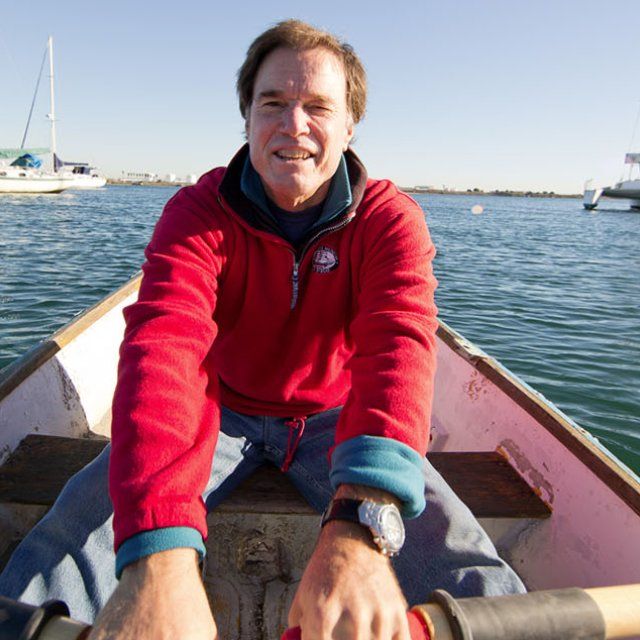Dr. Rick Kennedy Rowing a Boat