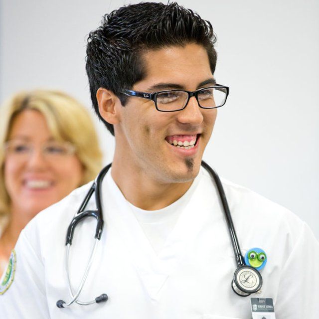 PLNU Nursing Student Smiling with Stethoscope Around His Neck