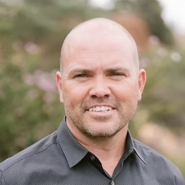 Portrait headshot of Christopher Bateman. 