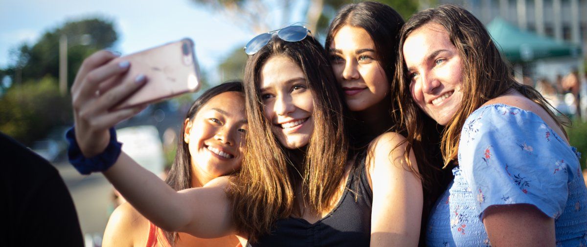 Students gather for a selfie