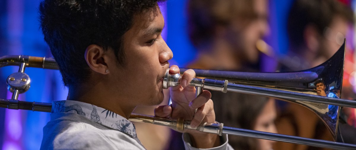 PLNU student plays the trumpet.