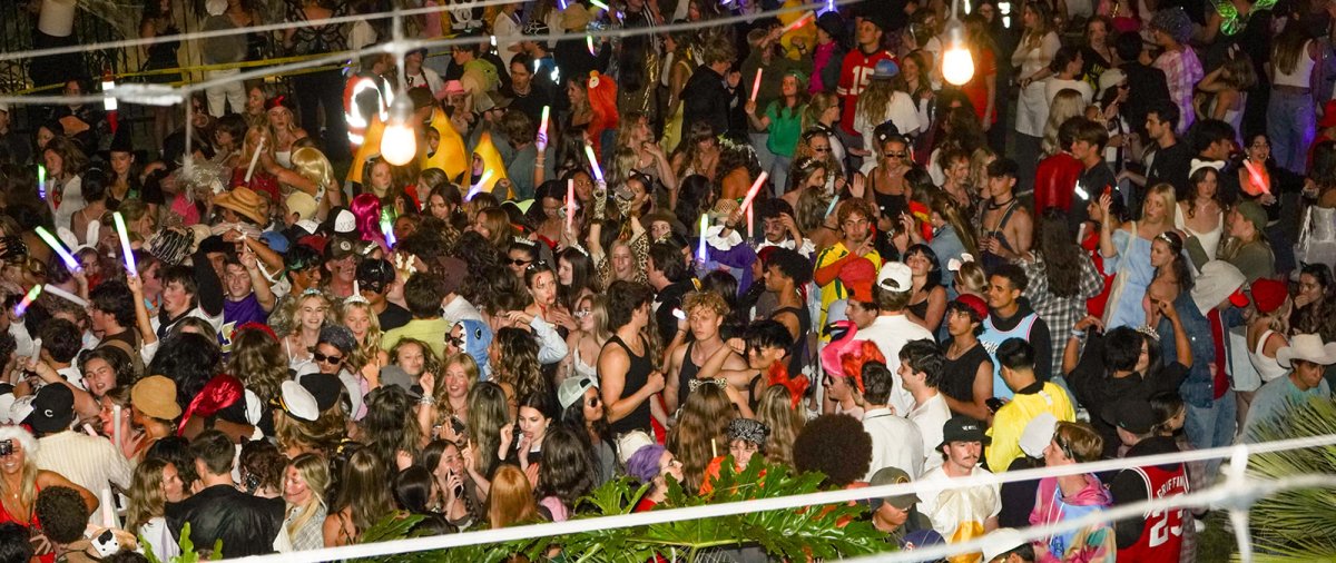 Large group of PLNU students at a school dance