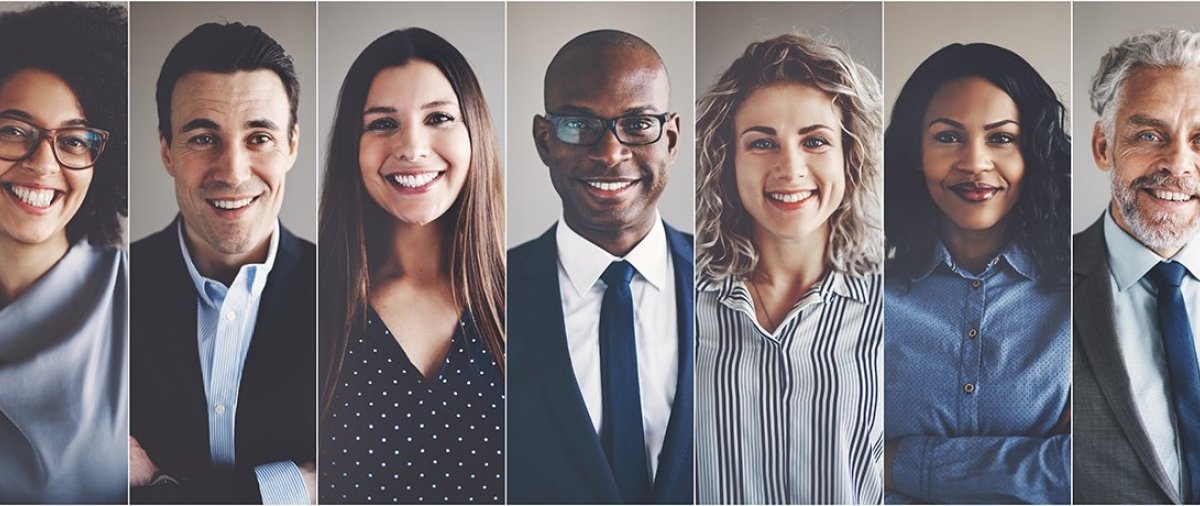 Headshots of seven business professionals