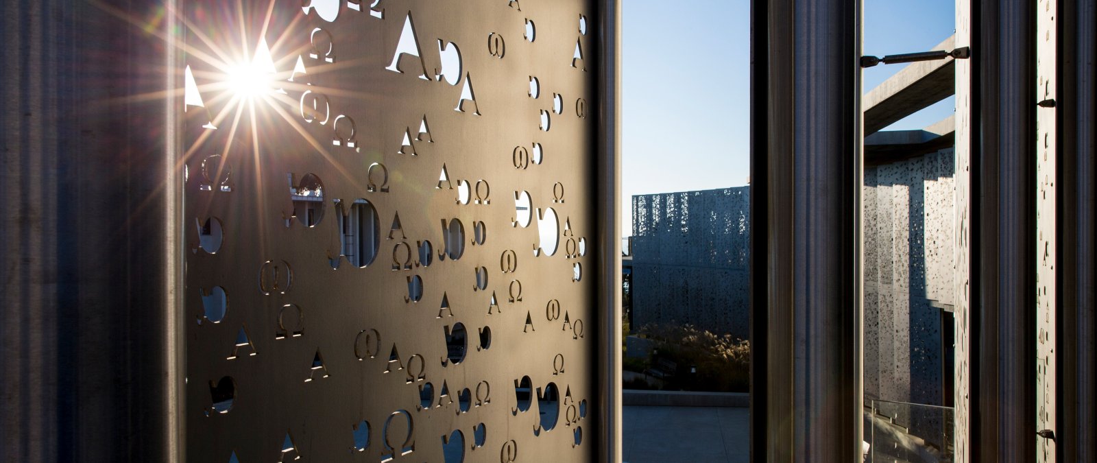 light Flares through the Alpha and Omega panels of Sator Hall