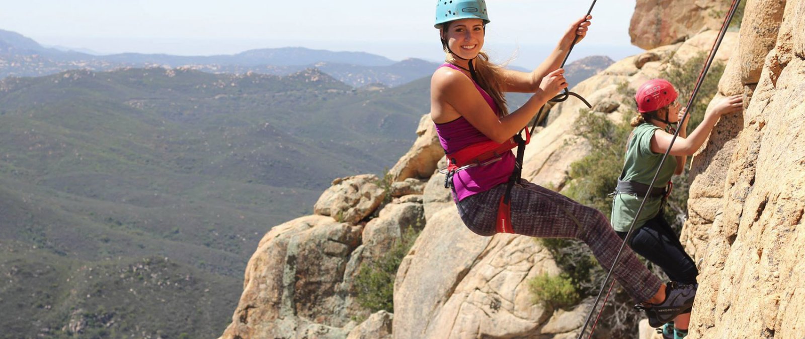 A student climbs Descanso Wall during a Great Escapes rock climbing trip.