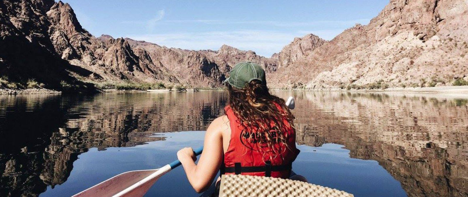 A student canoes up the Colorado River during a fall break trip.